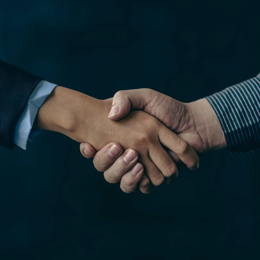 Handshake greeting or business cooperation, business deal concept